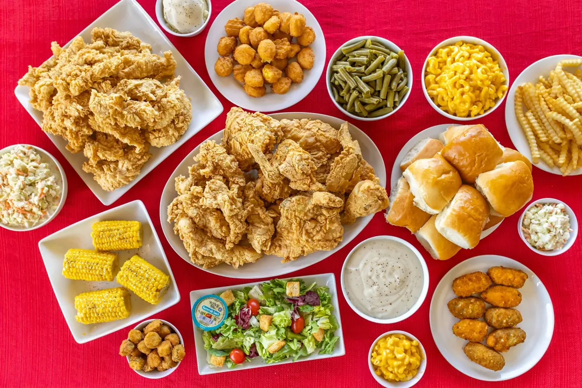 Party spread of chicken and sides