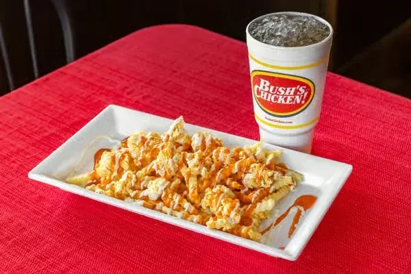 Buffalo loaded fries with a drink